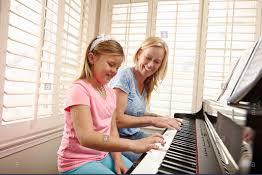 Piano mom and daughter